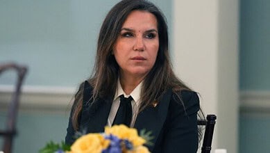 Lebanese diplomat Nada Moawad in a formal setting during a meeting or interview.