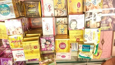 Shops displaying various beauty and skincare products in Hyderabad, India.