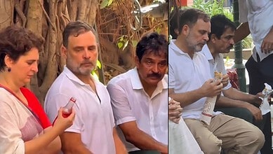 Rahul Gandhi with a group of people outdoors, engaging in conversation and holding snacks.