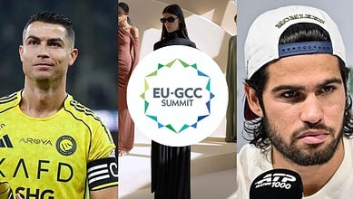 Attendees at the EU-GCC Summit, including a woman in sunglasses and a man in a cap, with the summit logo.