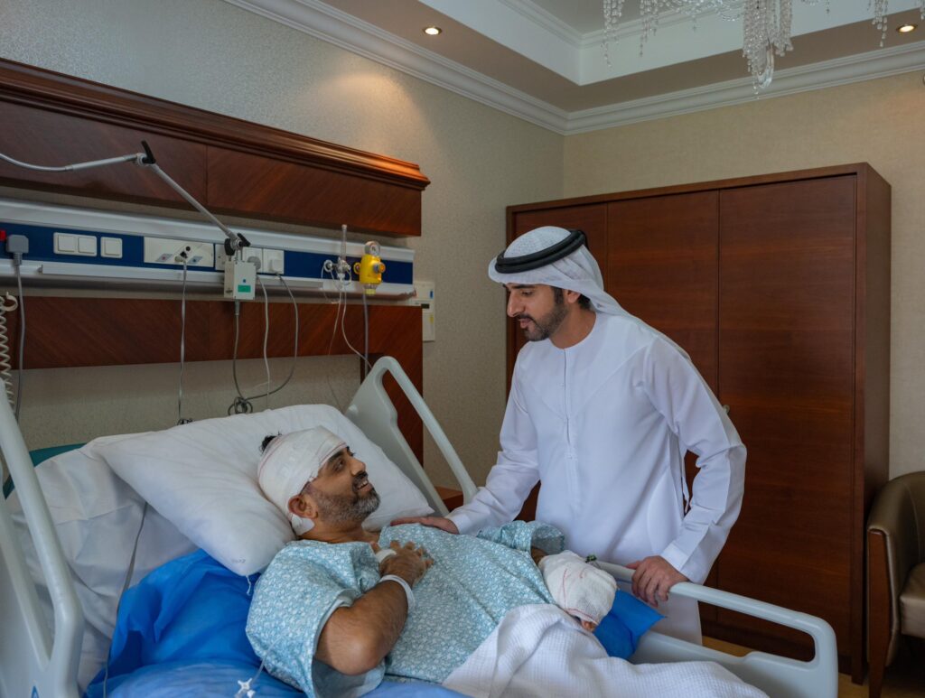 Sheikh Hamdan speaks with injured flydubai pilot Smit Machchhar.