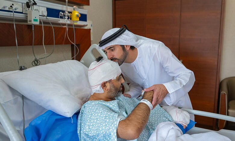 Doctor examining an Indian patient with head injury in hospital room.