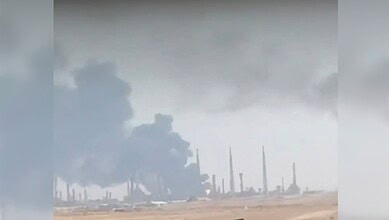Thick smoke rising from an industrial area near Aramco facility in Riyadh, Saudi Arabia.
